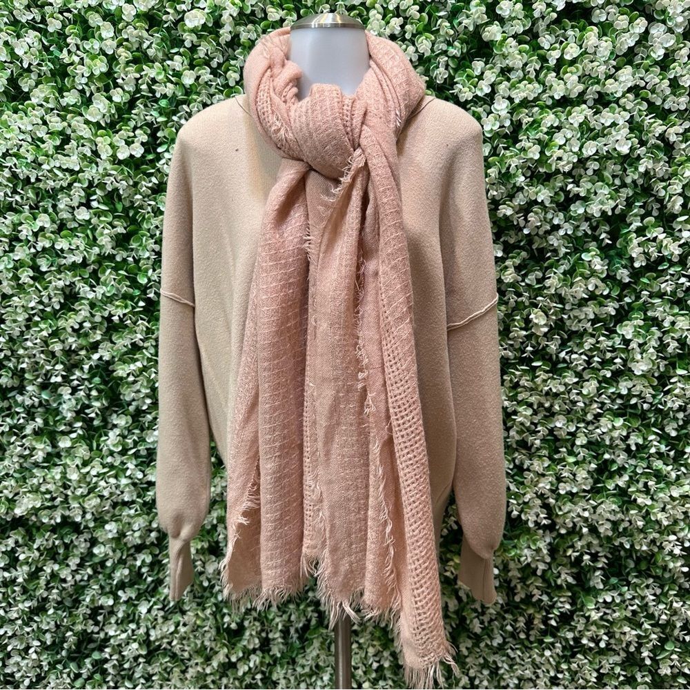 Pale pink knit extra wide scarf with frayed edges soft warm lightweight textured